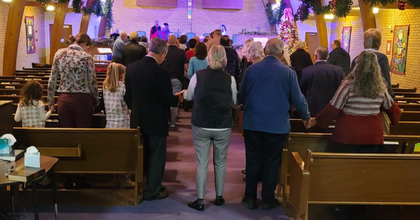 church members in prayer